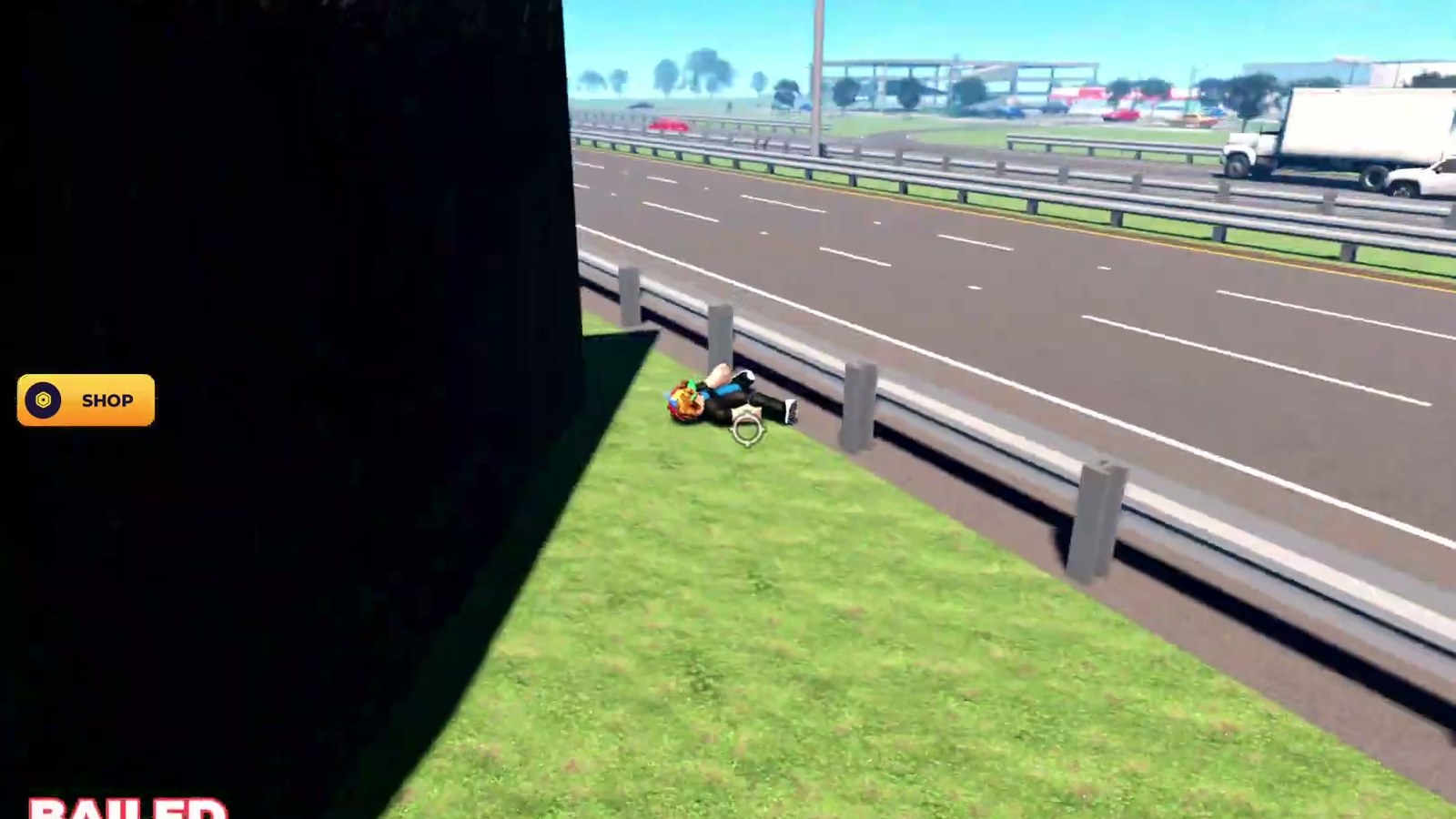 A rider down beside the highway in Bike Universe, with BAILED on screen