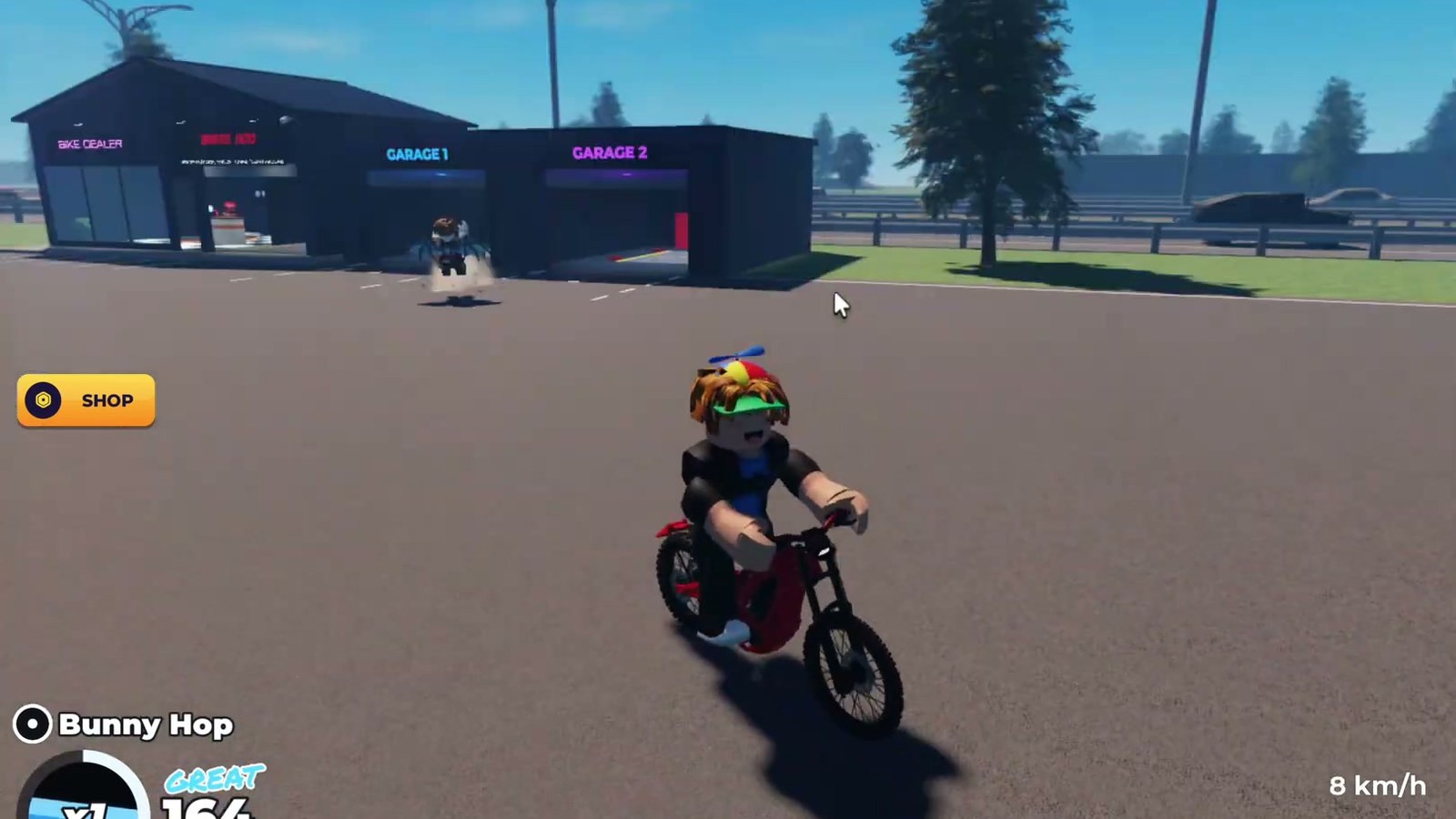 Bike Universe bike dealer lot with the garage doors behind the spawn area