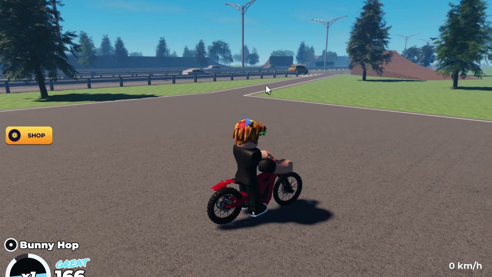 A rider on the road in Bike Universe with the HUD row visible